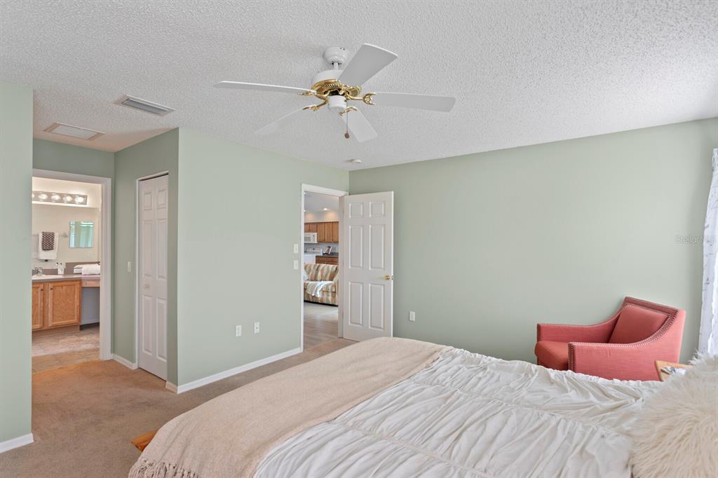 11751 Aintree Court Trinity, FL 34655 - Photo 21 of 45 a bedroom with a bed and closet