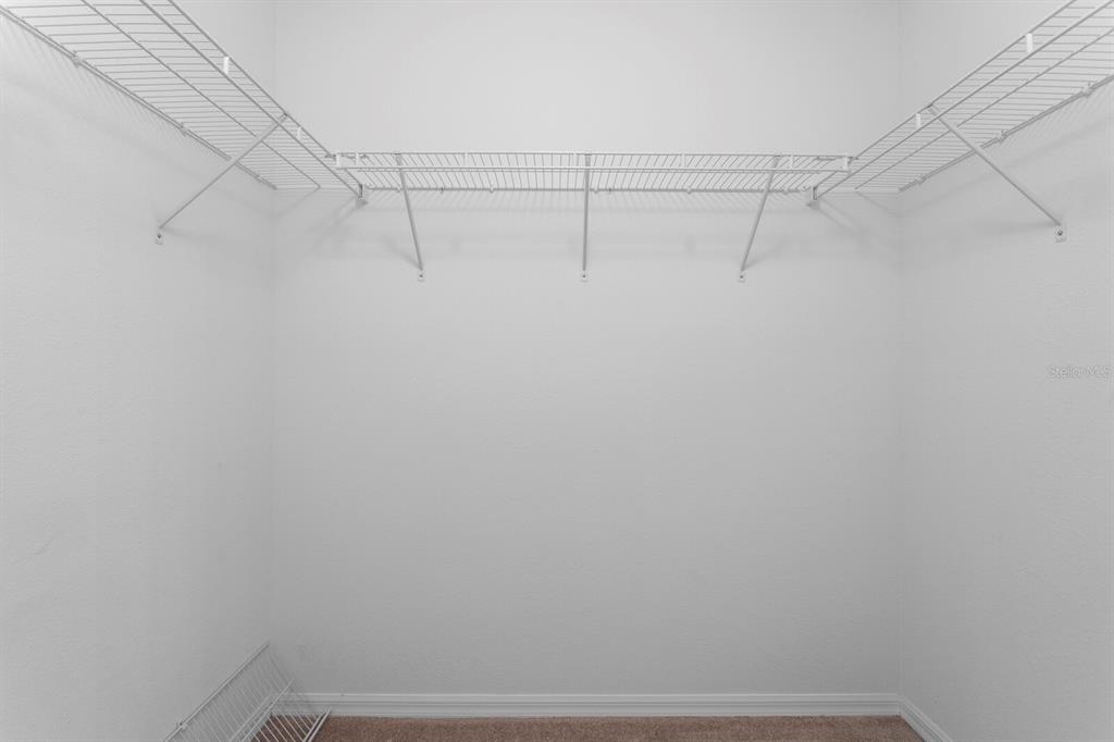 11751 Aintree Court Trinity, FL 34655 - Photo 22 of 45 a view of a room with racks on the wall