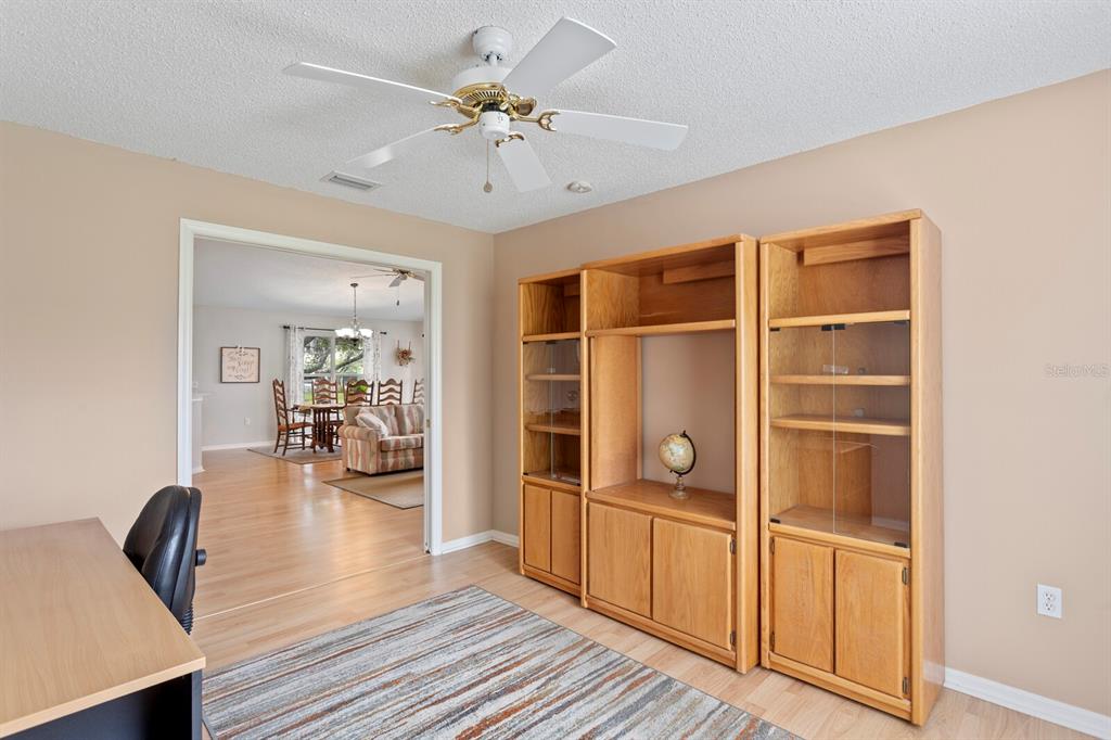 11751 Aintree Court Trinity, FL 34655 - Photo 26 of 45 a view of a livingroom with furniture and workspace