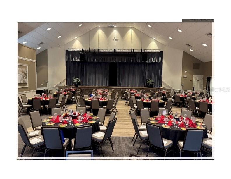 11751 Aintree Court Trinity, FL 34655 - Photo 44 of 45 a view of a dining room with furniture and a chandelier
