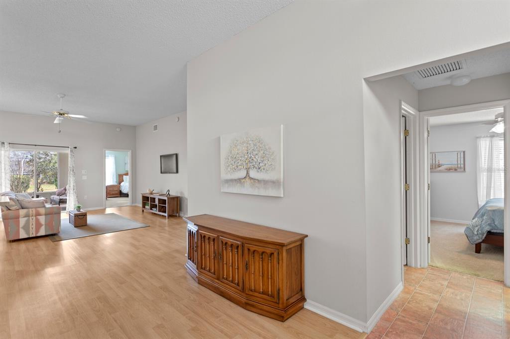 11751 Aintree Court Trinity, FL 34655 - Photo 5 of 45 a view of a livingroom with furniture and hardwood floor
