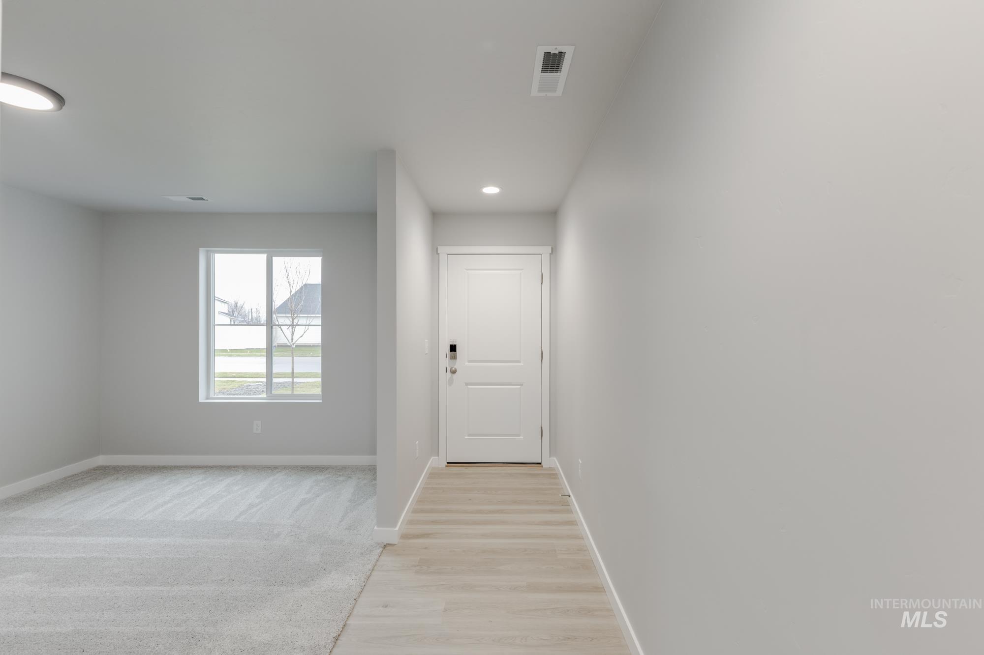 1591 Covington Street Middleton, ID 83644 - Photo 2 of 23 Hall featuring light wood-style flooring and recessed lighting