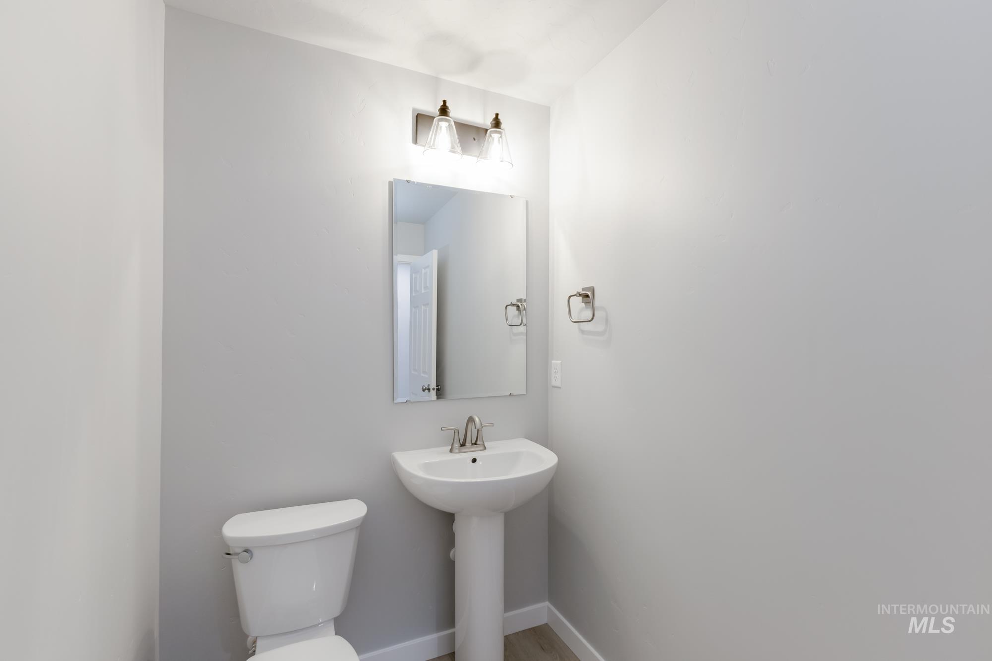 1591 Covington Street Middleton, ID 83644 - Photo 9 of 23 Half bath with toilet and baseboards