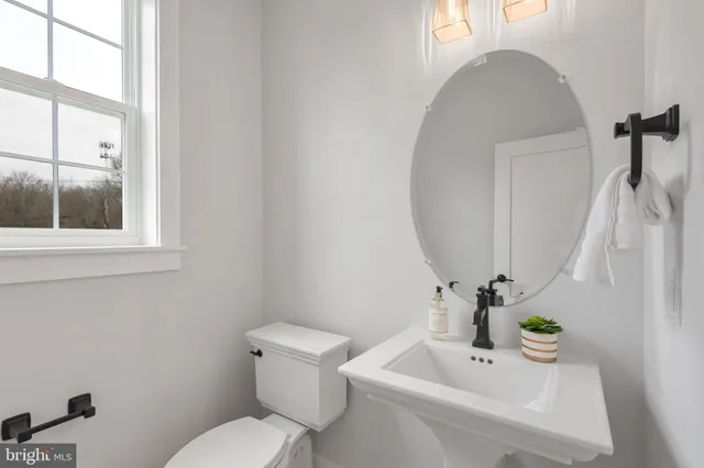 a bathroom with a sink and a toilet