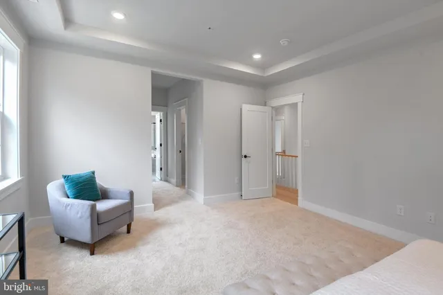 a view of livingroom with furniture and window