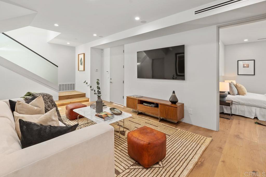 431 Marview Lane Solana Beach, CA 92075 - Photo 16 of 37 a living room with furniture and a flat screen tv