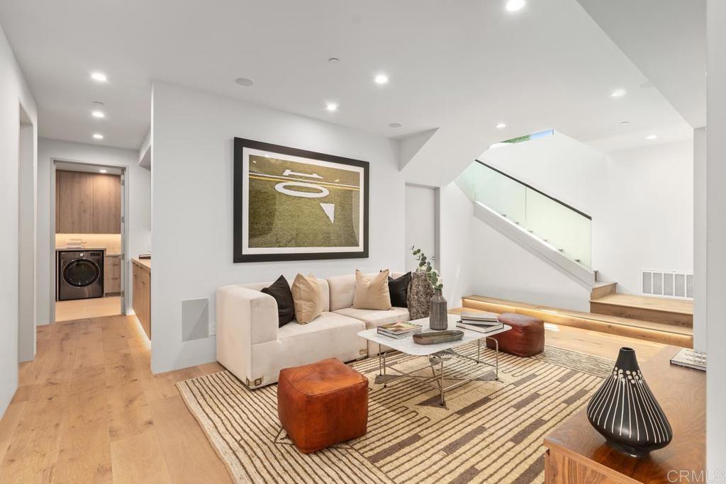 431 Marview Lane Solana Beach, CA 92075 - Photo 17 of 37 a living room with furniture and a table