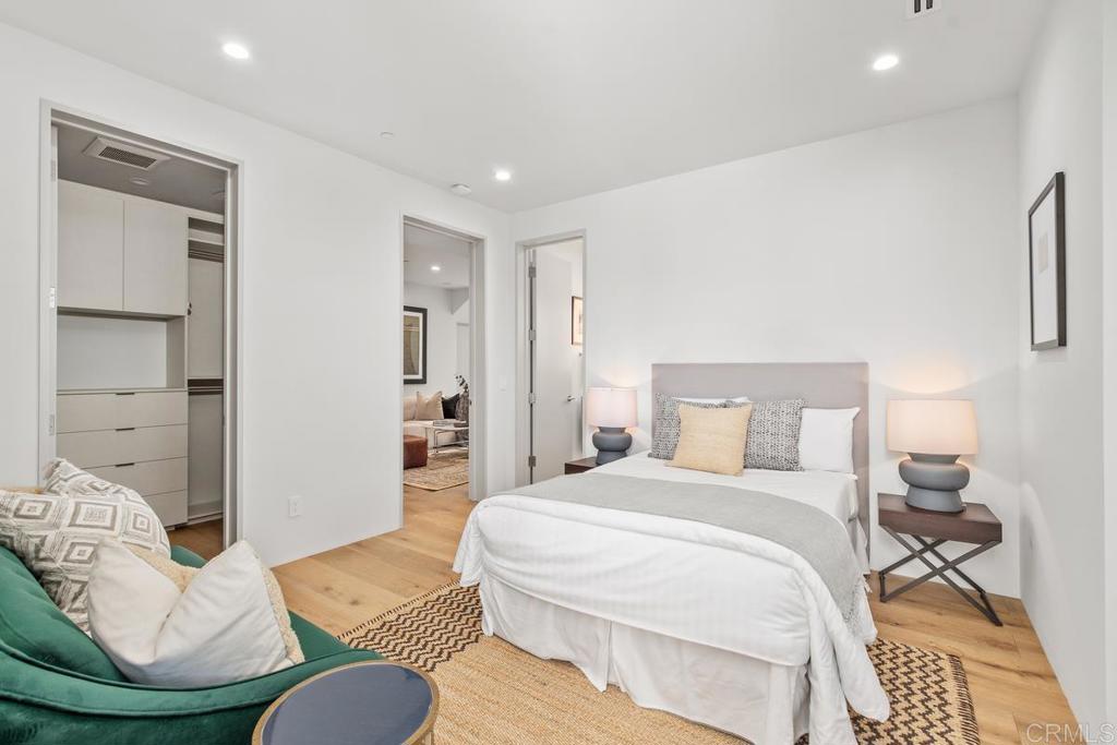 431 Marview Lane Solana Beach, CA 92075 - Photo 20 of 37 a bedroom with a bed and couch