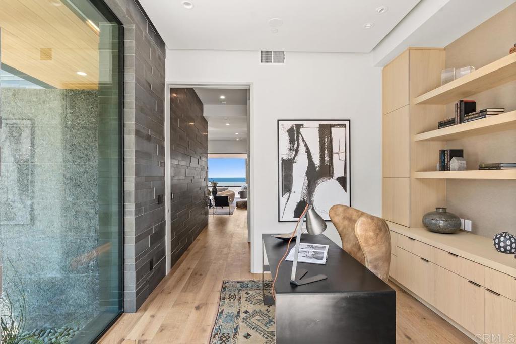 431 Marview Lane Solana Beach, CA 92075 - Photo 21 of 37 a room with lots of gym equipment