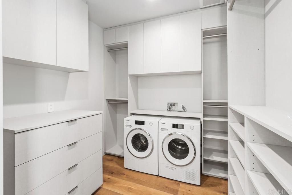 431 Marview Lane Solana Beach, CA 92075 - Photo 29 of 37 a utility room with sink dryer and washer