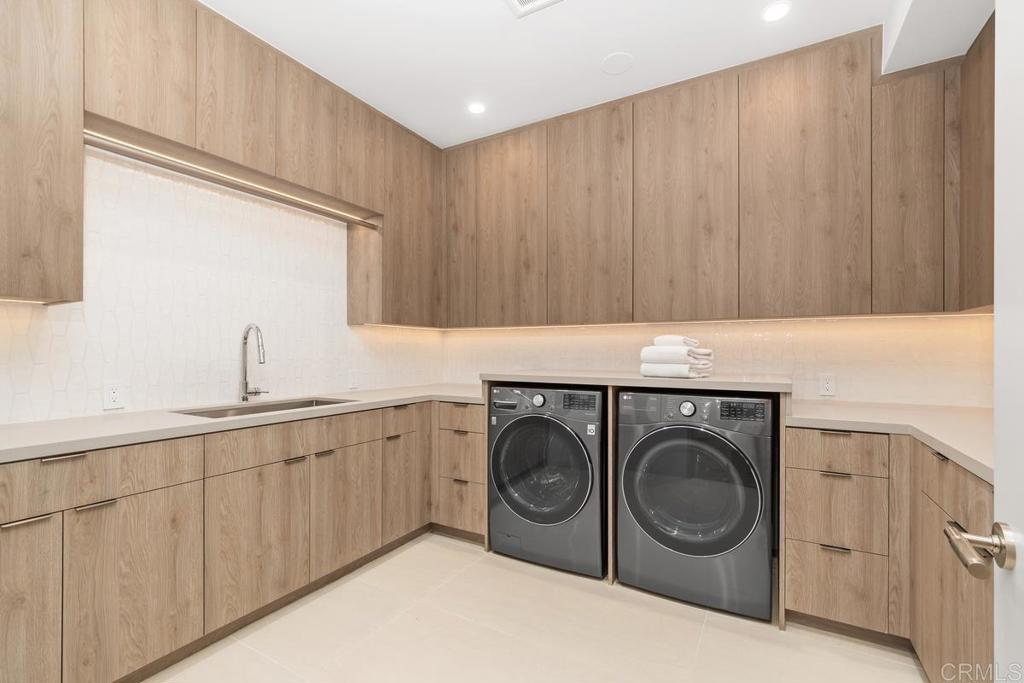 431 Marview Lane Solana Beach, CA 92075 - Photo 32 of 37 a utility room with sink dryer and washer