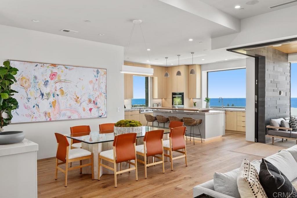 431 Marview Lane Solana Beach, CA 92075 - Photo 34 of 37 a view of a dining room with furniture and wooden floor
