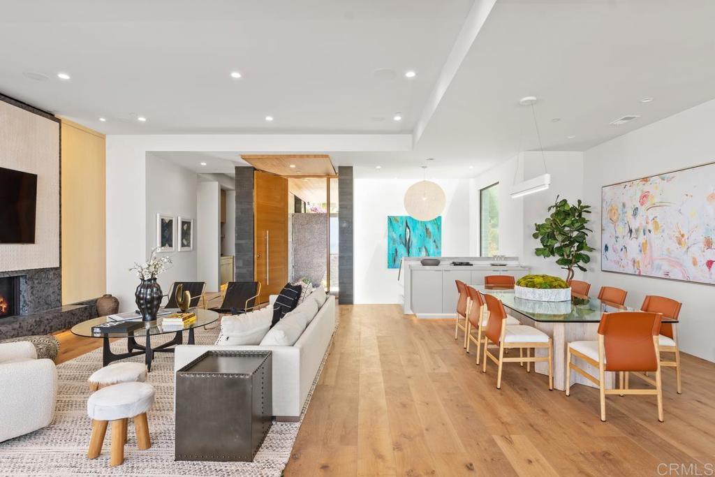 431 Marview Lane Solana Beach, CA 92075 - Photo 6 of 37 a living room with furniture and a flat screen tv