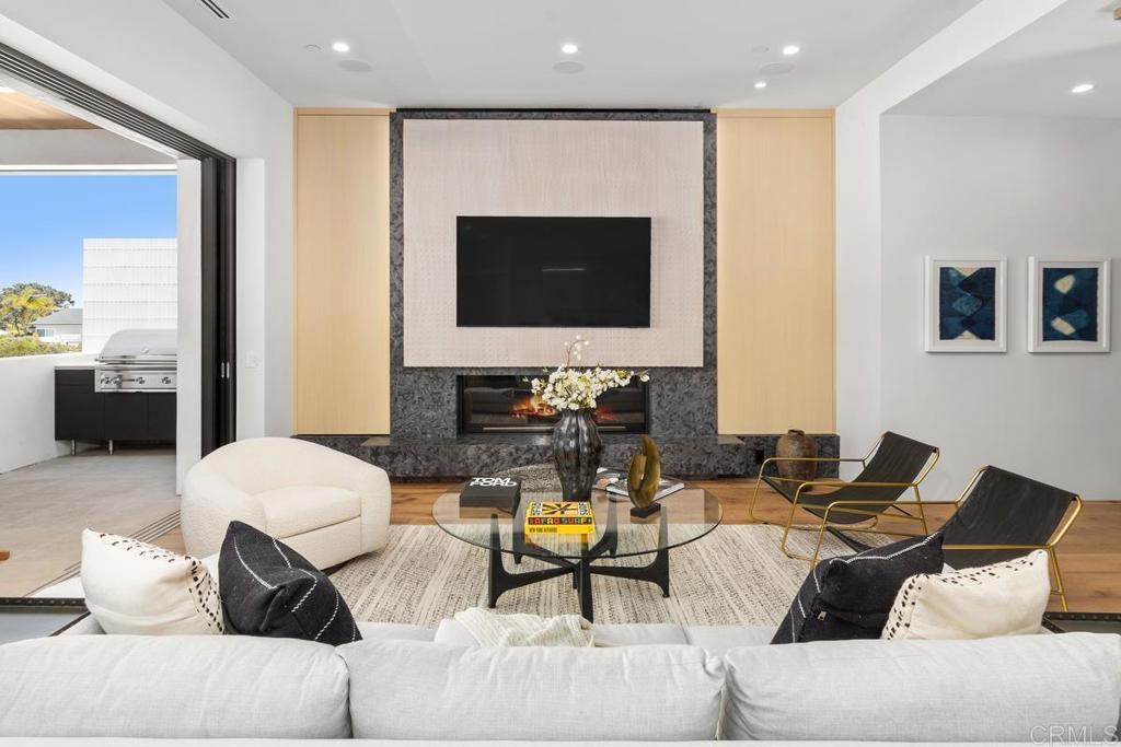 431 Marview Lane Solana Beach, CA 92075 - Photo 7 of 37 a living room with furniture and a flat screen tv