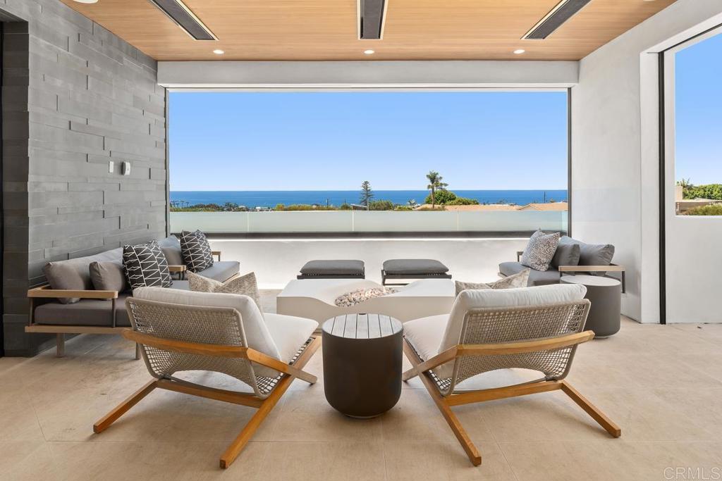 431 Marview Lane Solana Beach, CA 92075 - Photo 10 of 37 a living room with couches chairs and a window