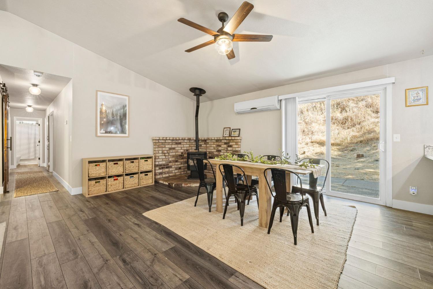 4842 Northern Lights Road Placerville, CA 95667 - Photo 7 of 26 a view of a dining room with furniture and wooden floor