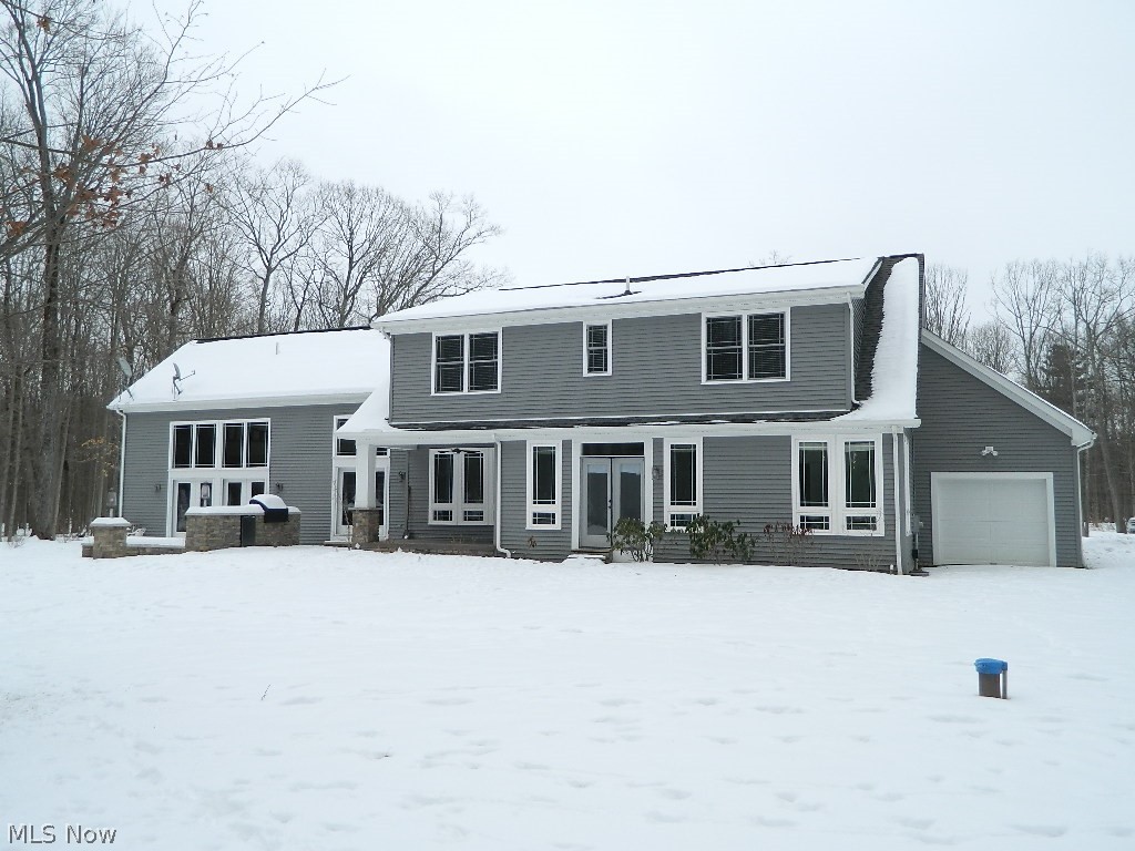 12464 Hotchkiss Road Burton, OH 44021 - Photo 32 of 35 Back of House - Note the Extra Garage Door with Back Yard Access!