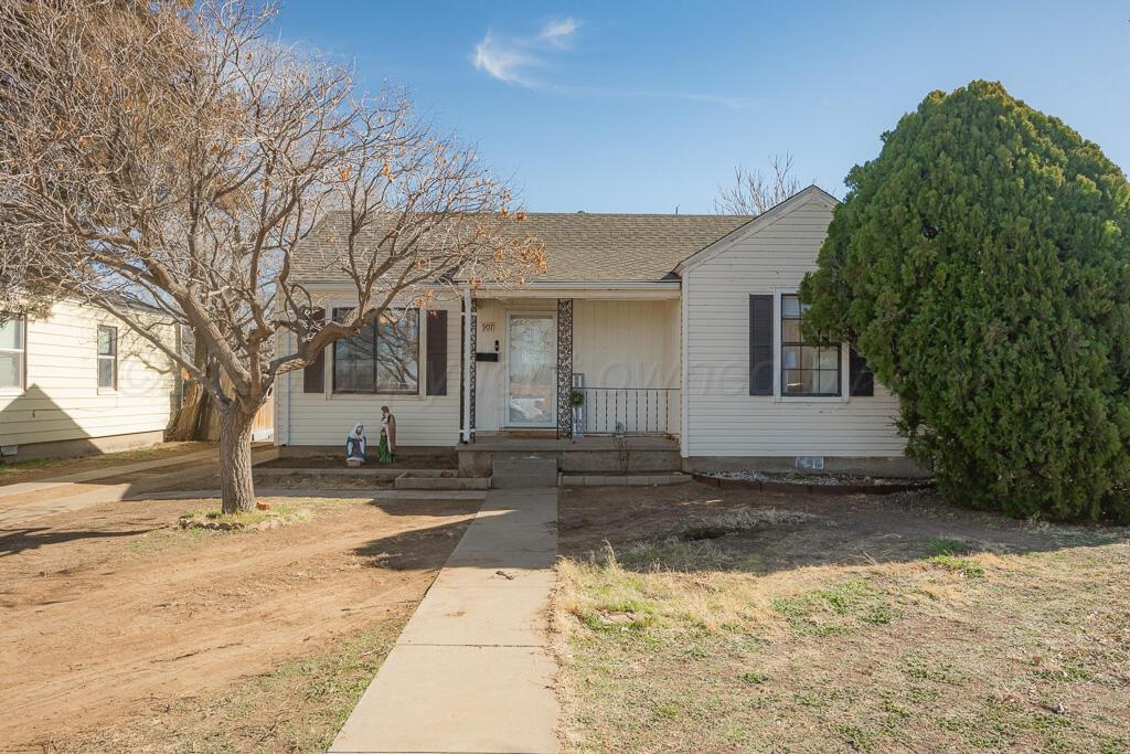 907 South Rusk Street Amarillo, TX 79102 - Photo 1 of 1 a view of a house with a yard