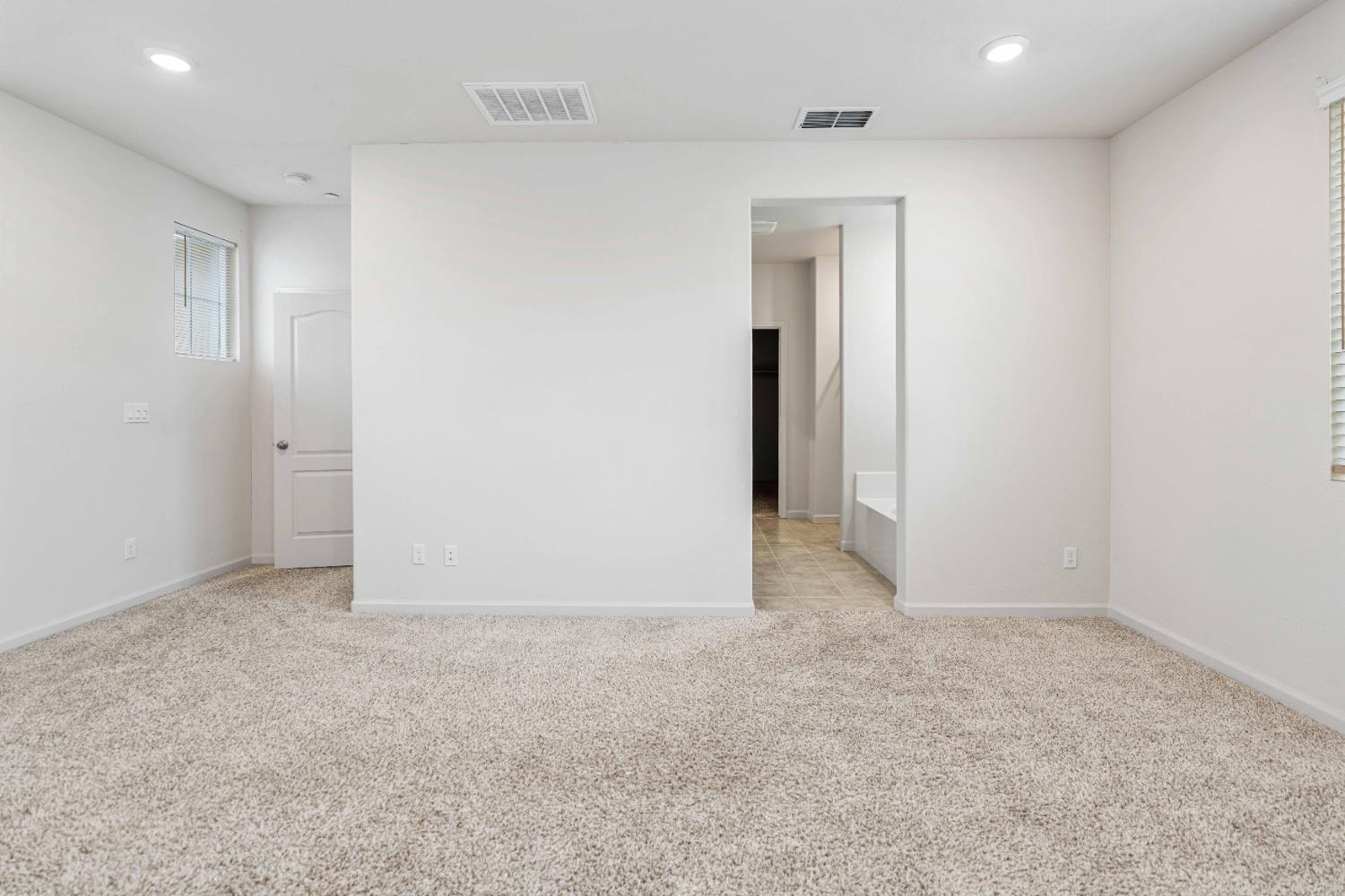 3095 Tower Street Manteca, CA 95337 - Photo 25 of 40 an empty room with closet and a bathroom