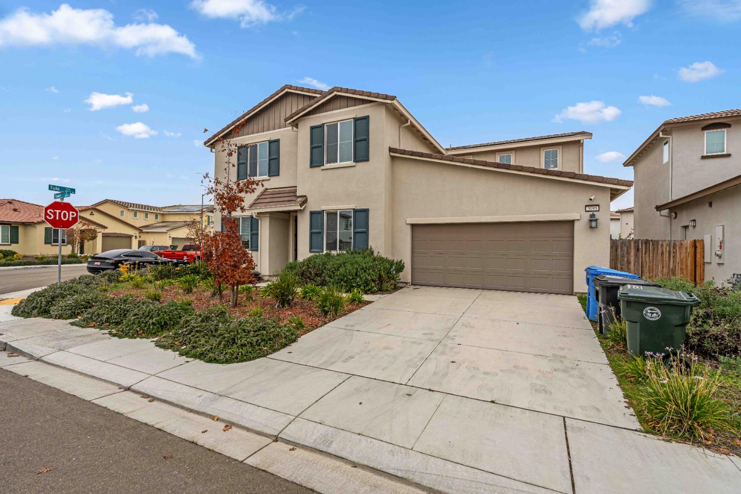 3095 Tower Street Manteca, CA 95337 - Photo 3 of 40 a front view of a house with a yard