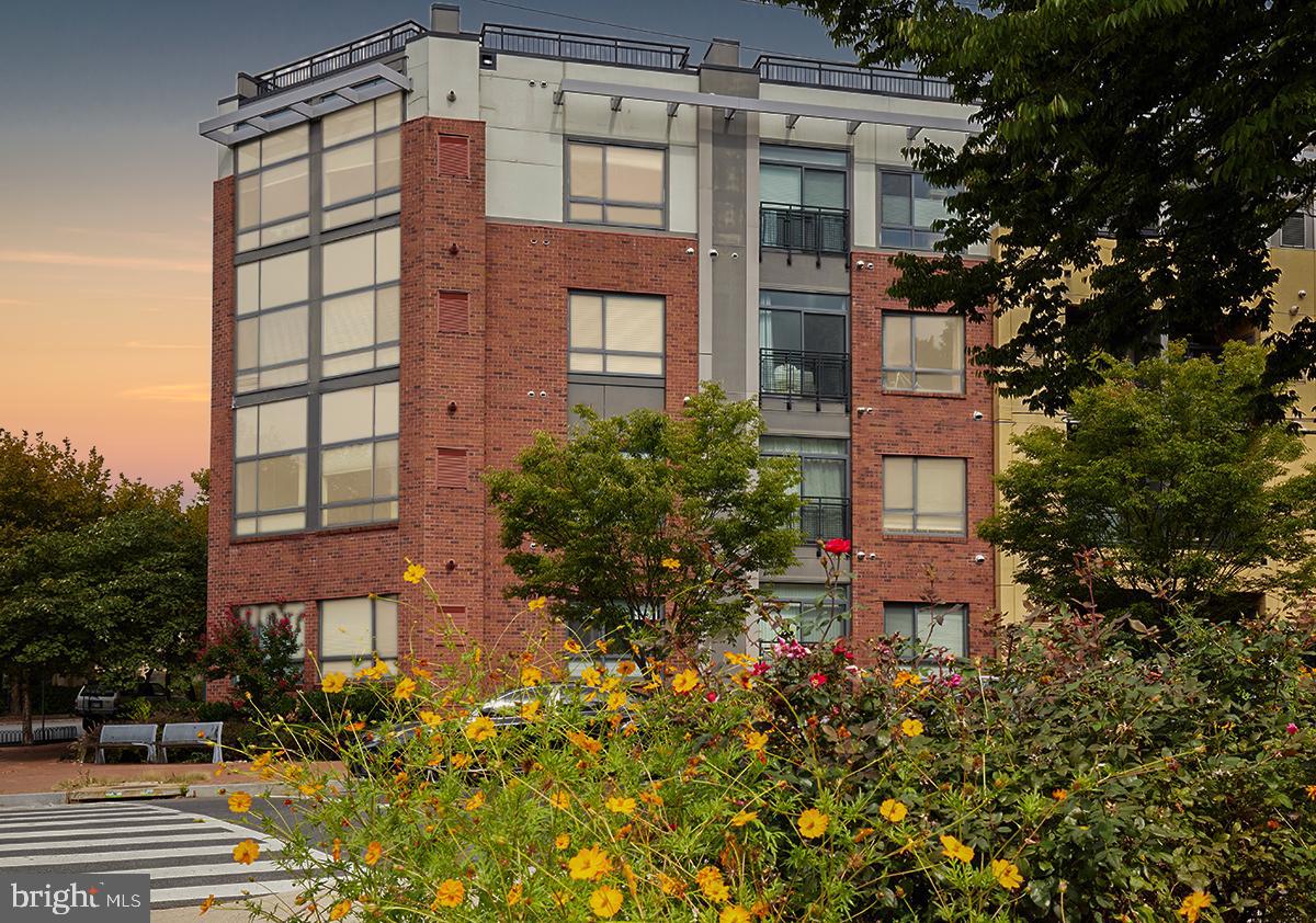 8005 13th Street, Unit 104 Silver Spring, MD 20910 - Photo 2 of 34 a building view with a outdoor space