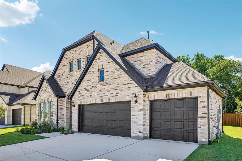 1516 Rose Mallow Road Celina, TX 75009 - Photo 4 of 22 With neutral brick and striking dark trim, this dream home offers a 3 car garage and tons of curb appeal!