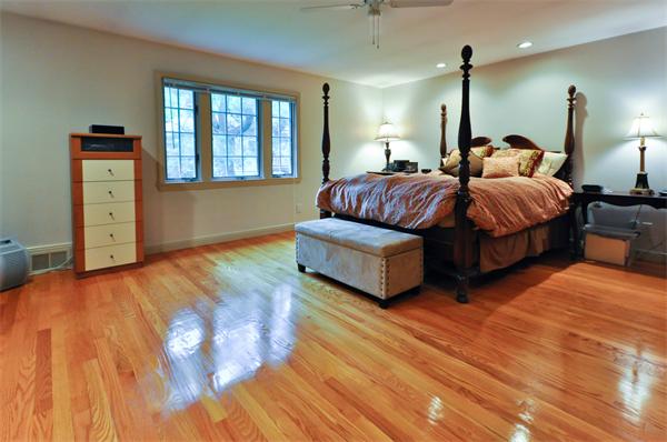 12 Ferncroft Road Newton, MA 02468 - Photo 14 of 24 a bedroom with double bed and a dresser