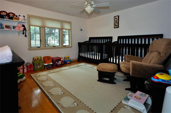 12 Ferncroft Road Newton, MA 02468 - Photo 16 of 24 a bedroom with furniture and a window