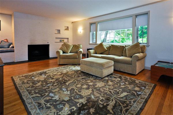 12 Ferncroft Road Newton, MA 02468 - Photo 2 of 24 a living room with furniture and a large window