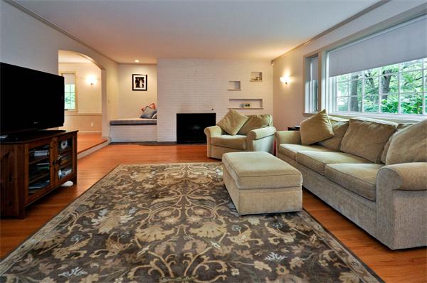 12 Ferncroft Road Newton, MA 02468 - Photo 3 of 24 a living room with furniture and a flat screen tv