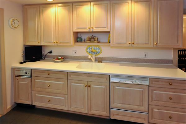 12 Ferncroft Road Newton, MA 02468 - Photo 8 of 24 a kitchen with granite countertop white cabinets and sink