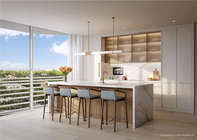 a kitchen with a table chairs sink and cabinets