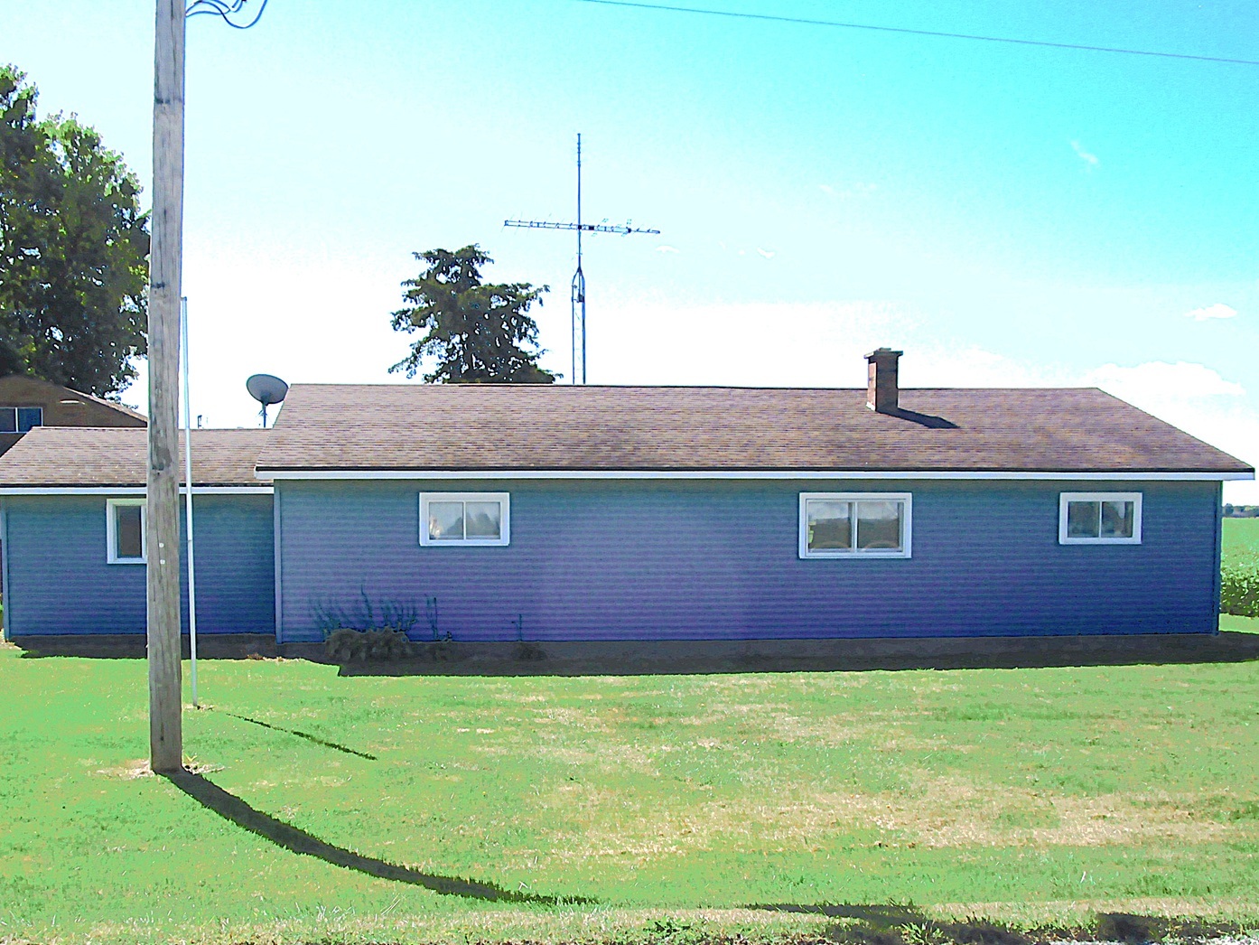 1713 Nauman Road Amboy, IL 61310 - Photo 1 of 38 a brick house with a yard