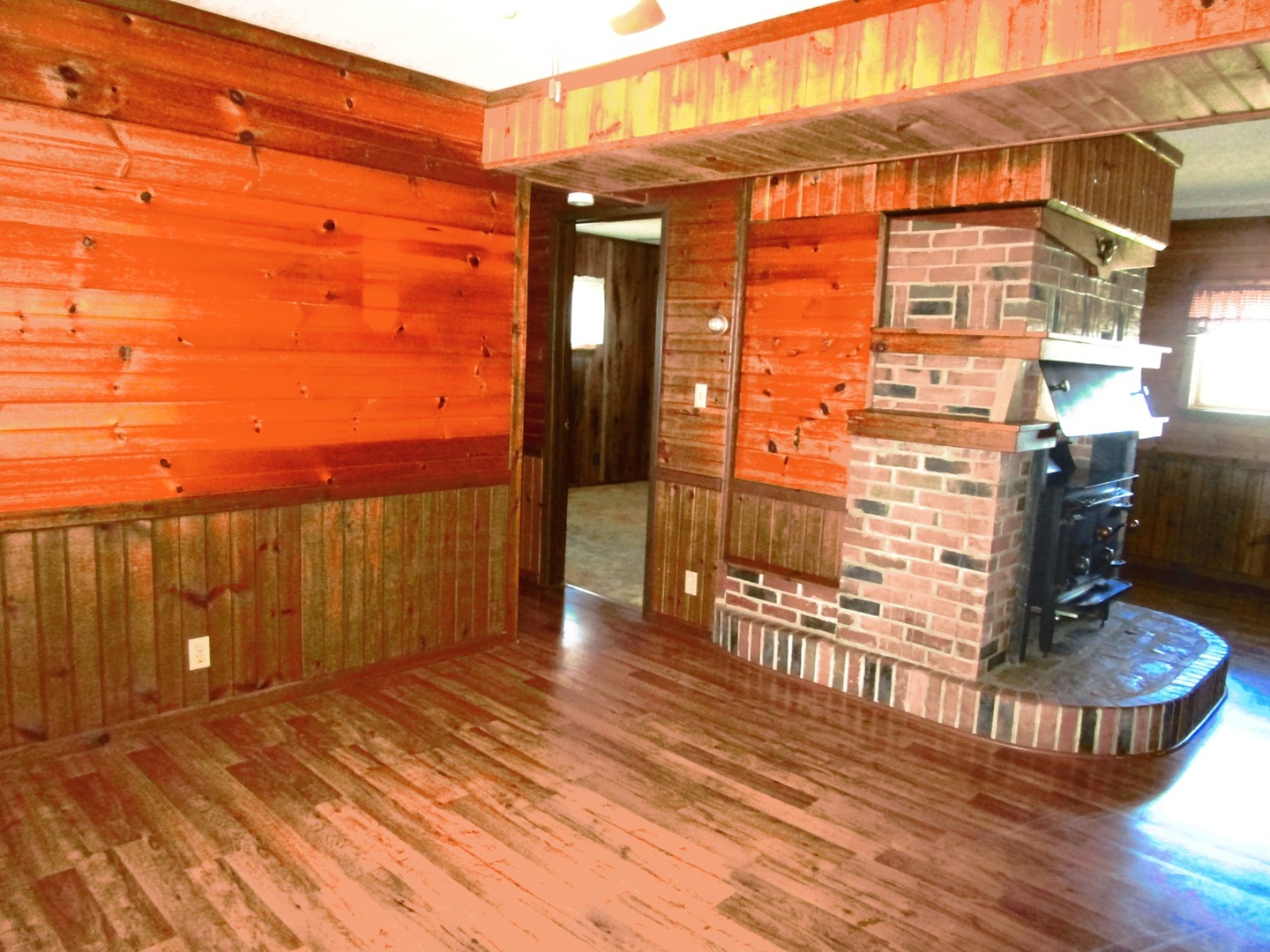 1713 Nauman Road Amboy, IL 61310 - Photo 13 of 38 a view of balcony with floor to ceiling windows and wooden floor