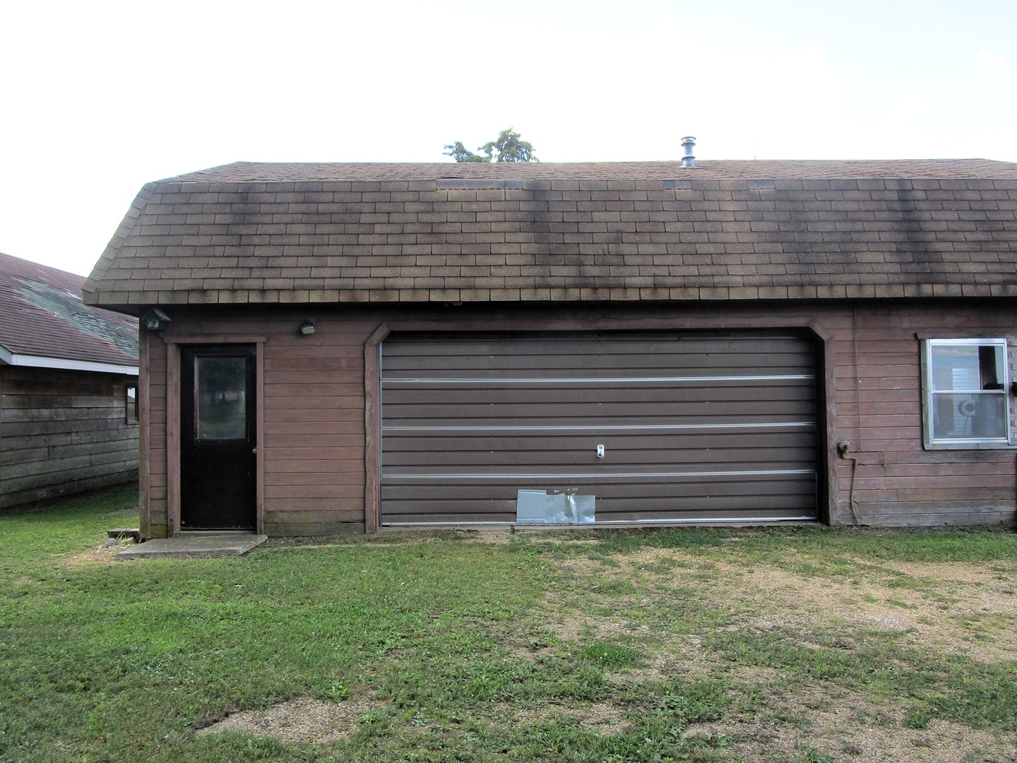 1713 Nauman Road Amboy, IL 61310 - Photo 26 of 38 a view of a house with a backyard