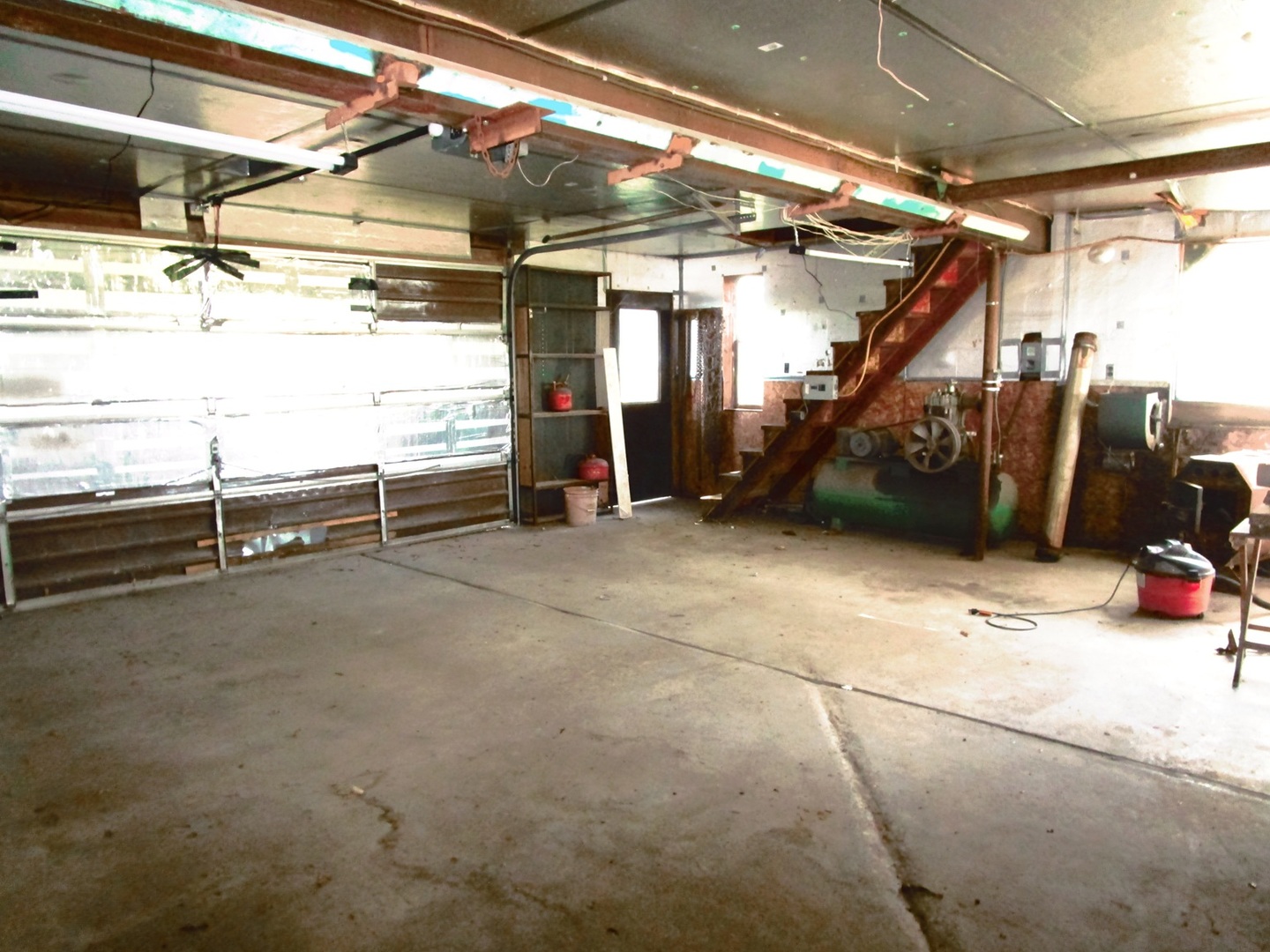 1713 Nauman Road Amboy, IL 61310 - Photo 29 of 38 a view of a garage with storage