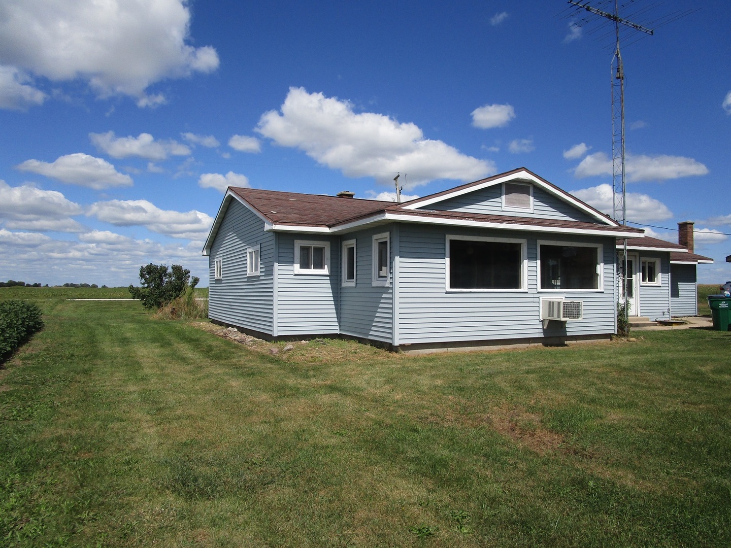 1713 Nauman Road Amboy, IL 61310 - Photo 38 of 38 a front view of a house with a garden