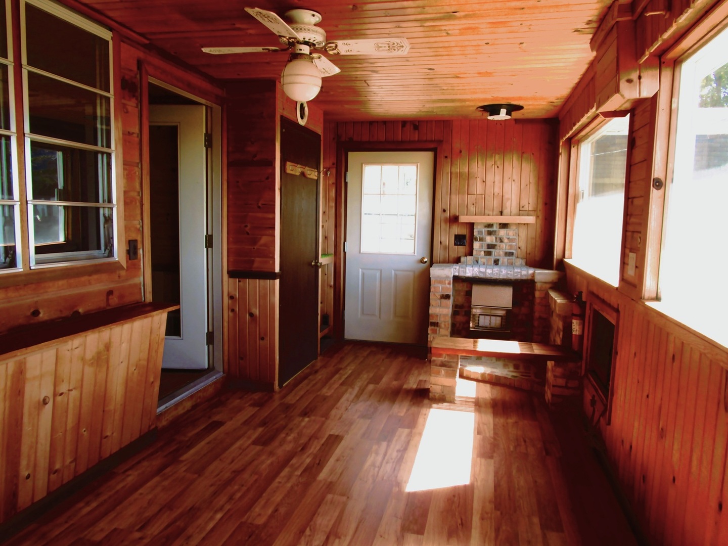 1713 Nauman Road Amboy, IL 61310 - Photo 4 of 38 a view of a porch with wooden floor and stairs