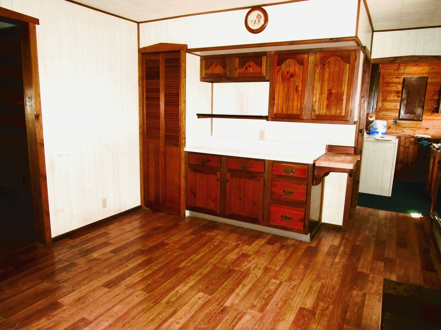 1713 Nauman Road Amboy, IL 61310 - Photo 6 of 38 an empty room with wooden floor and windows