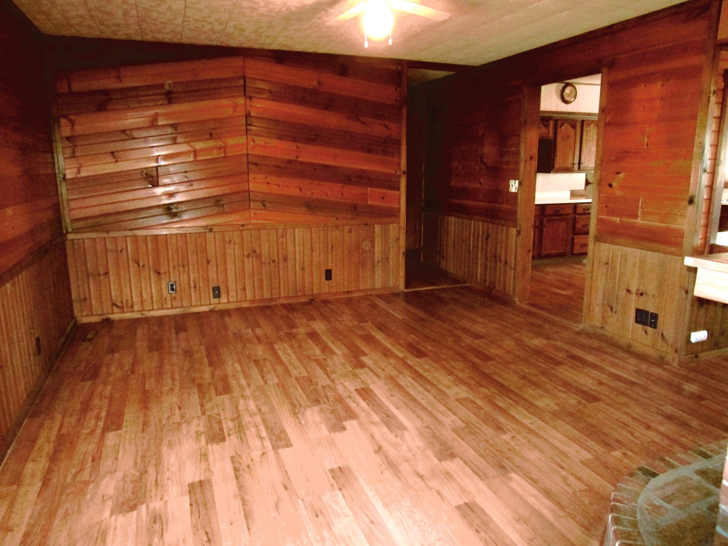 1713 Nauman Road Amboy, IL 61310 - Photo 9 of 38 a view of an empty room with wooden floor and a window