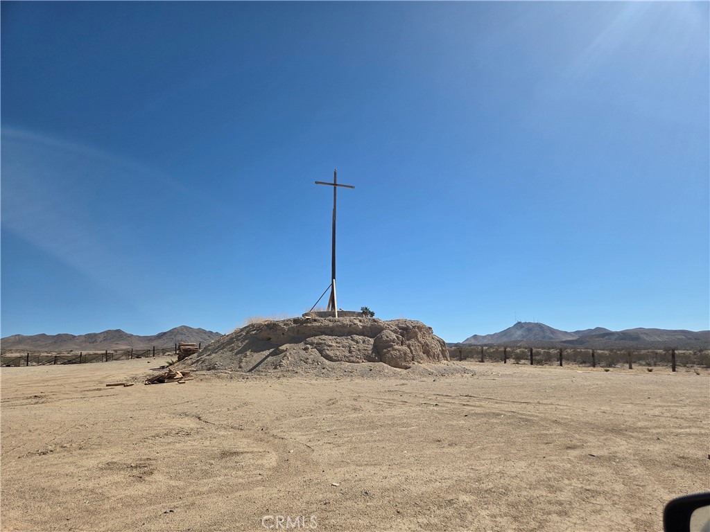 15411 Rattlesnake Gulch Oro Grande, CA 92368 - Photo 4 of 9 a view of a mountain with a outdoor space