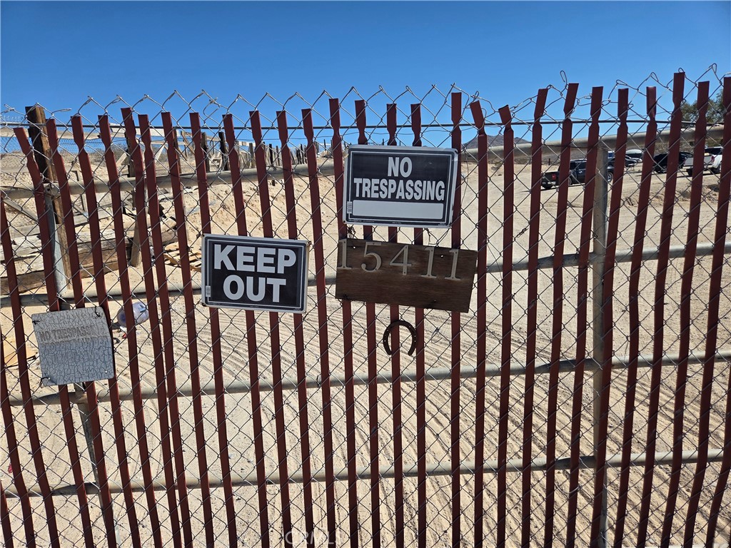 15411 Rattlesnake Gulch Oro Grande, CA 92368 - Photo 6 of 9 a view of wooden fence