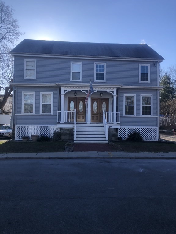 a view of a house with a deck