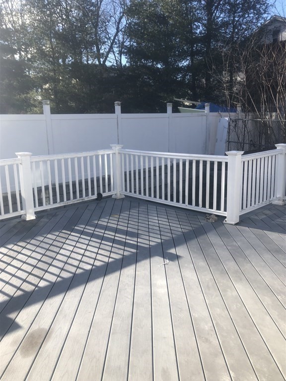 10-12 Tanglewood Road Boston, MA 02126 - Photo 11 of 17 a view of wooden floor