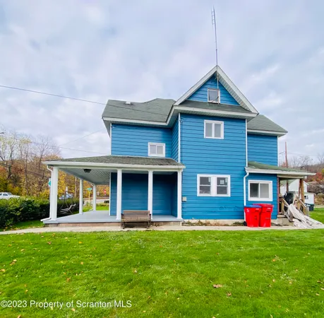 a bathroom with a sink a toilet and bathtub