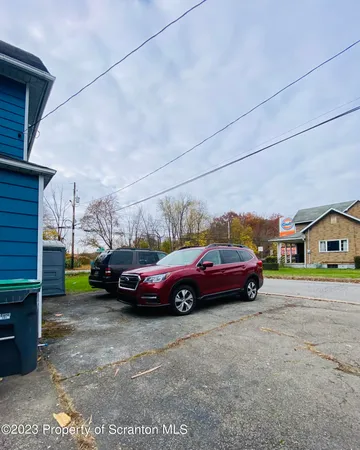 a bathroom with a sink vanity and mirror