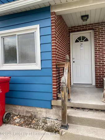 a front view of a house with entryway