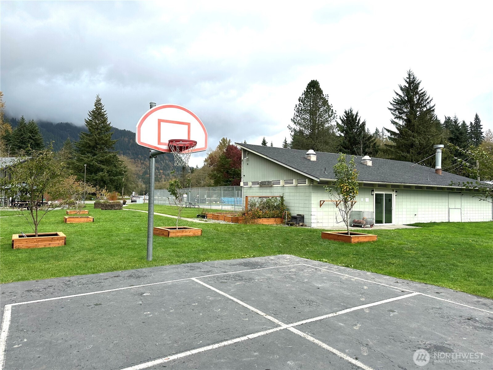 1 West Alder Drive Sedro-Woolley, WA 98284 - Photo 8 of 10 a view of a house with a yard and a patio