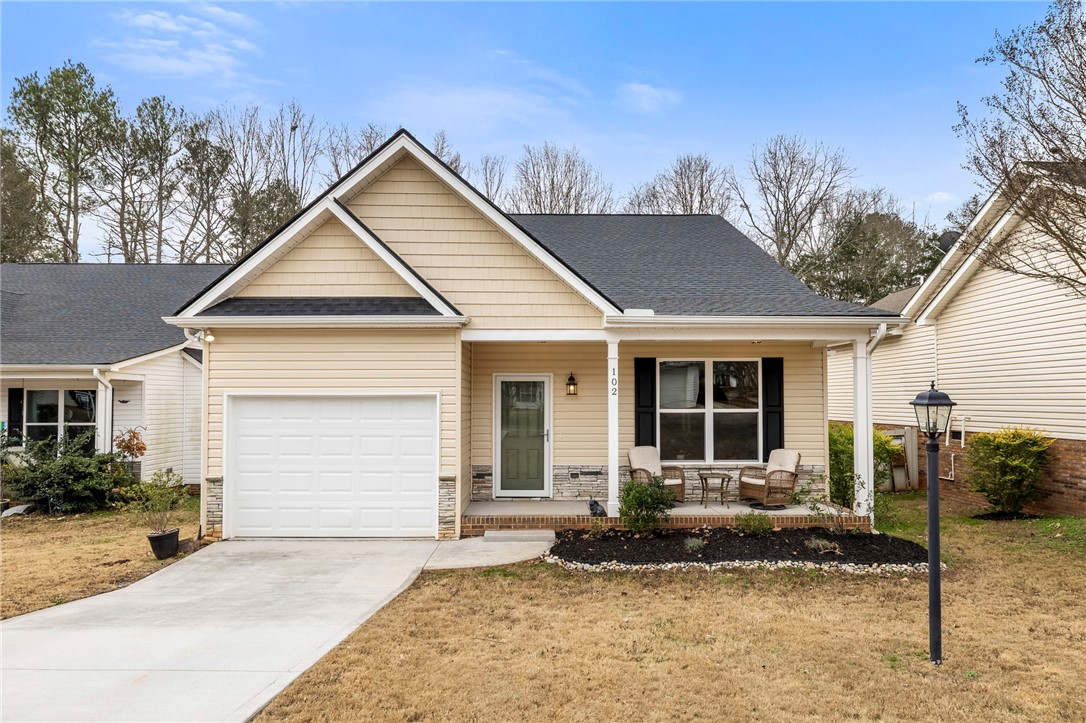 This charming home offers inviting curb appeal and a functional layout.