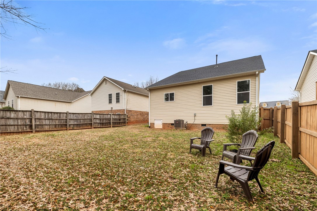 102 Colonial Court Pendleton, SC 29670 - Photo 29 of 30 This spacious private yard is fully fenced, offering ample outdoor living space.